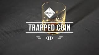 Trapped Coin - Learn Bar Bets for Free