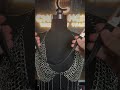 Black strap collar with clean silver studs