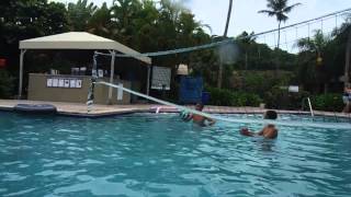 Becca, Bigguy and Daddy playing water volleyball