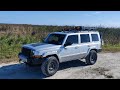 Lifted jeep commander on 33 tires