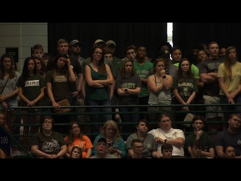 Thousands at UNCC honor slain classmates