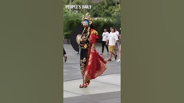 Thumbnail of A street artist performs Bian Lian, ace-changing, art