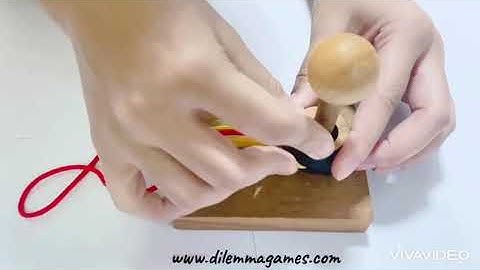 THE GORDIAN PILLAR A ring and string brain teaser by DILRMMA GAMES