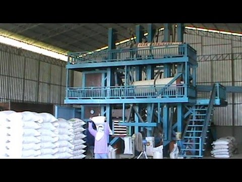 Commercial size rice mill in rural Thailand - YouTube