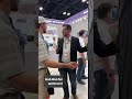 Roofers discussing the latest offerings of BTR Systems! | International Roofing Expo 2025