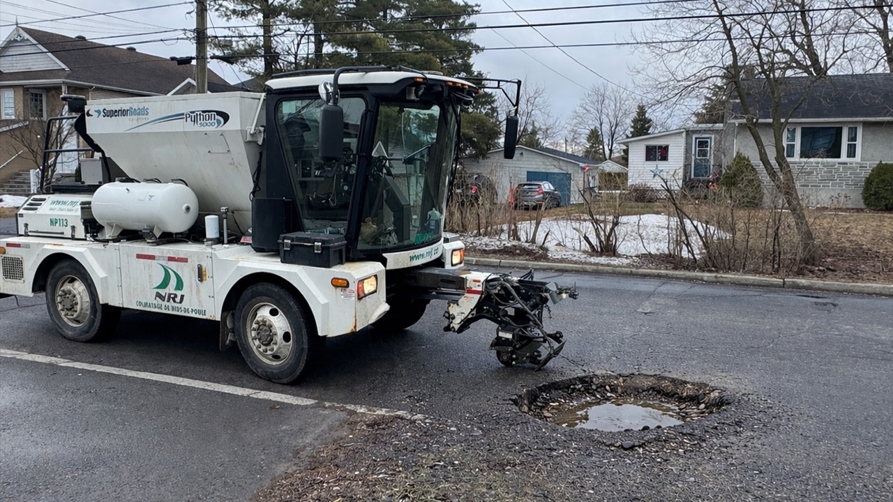 Python 5000 pothole-patching machine IN ACTION ! - YouTube