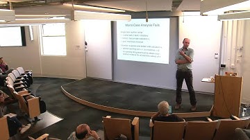 Outposts Between Worst- and Average Case Analysis: A Case Study in Auction Design