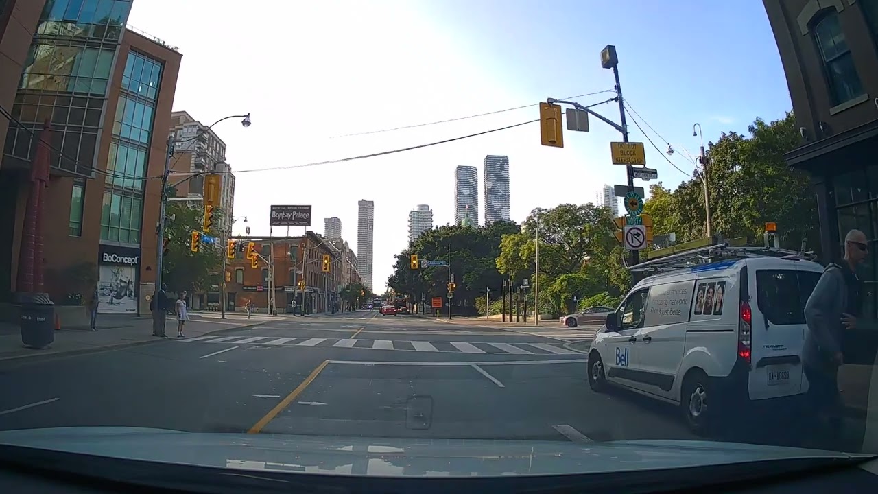 Bell Canada van hitting a bicycle