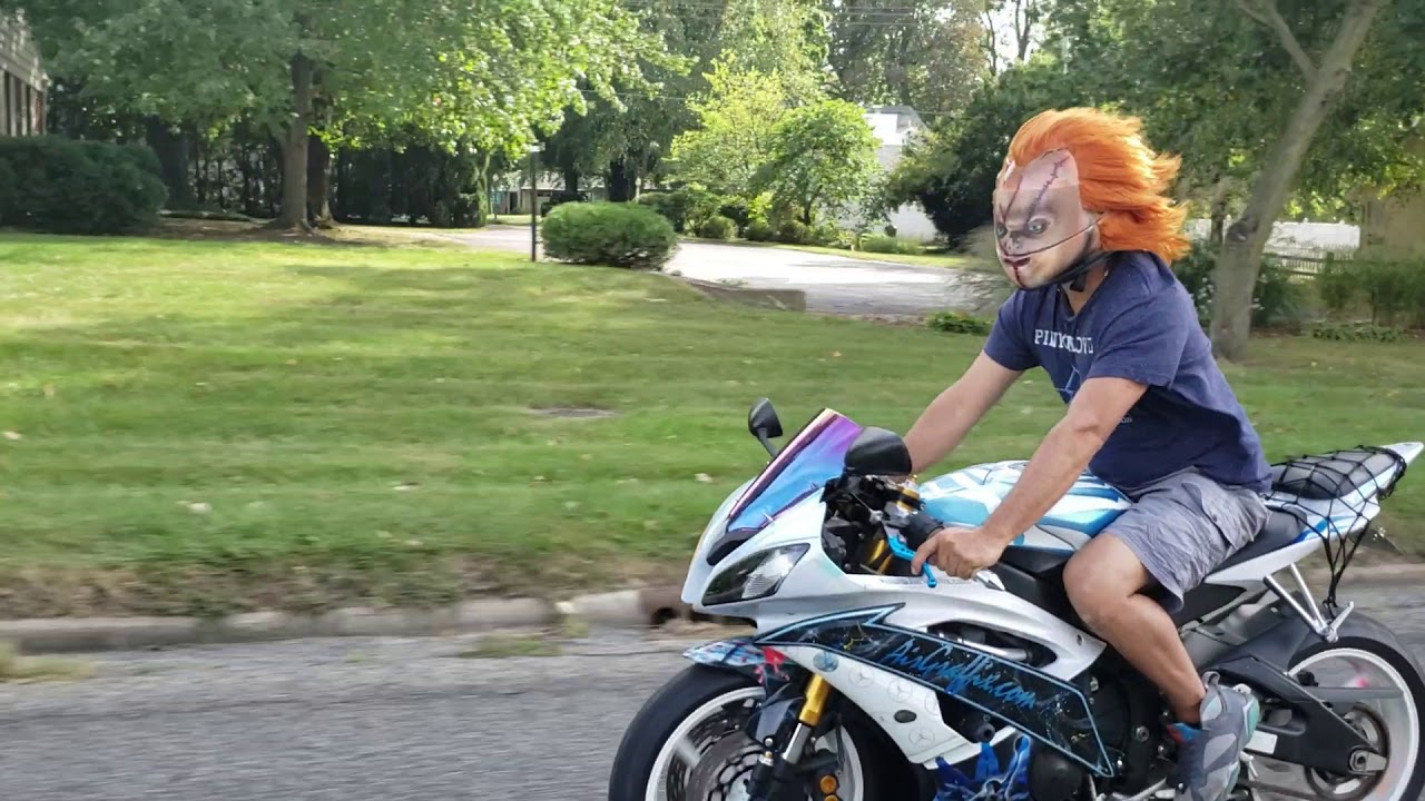 chucky motorcycle helmet Wind testing the custom painted Chucky helmet by airgraffix.com