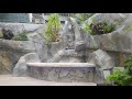 Mini cascade  avec banc personnalisé en béton sculpté by PAVA REUNION