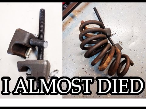 Video: Ano ang isang strut spring compressor?