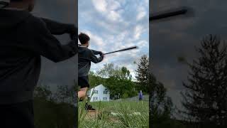 Boy hits baseball with bat and ball hits kid on face (Slow motion)