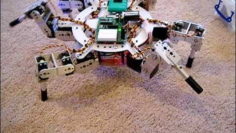 AH3-R Hexapod with a BS2 microcontroller and dual Propeller servo controls walking inside