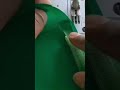 Steps to Install a Zipper on Green Fabric Using an Industrial Sewing Machine