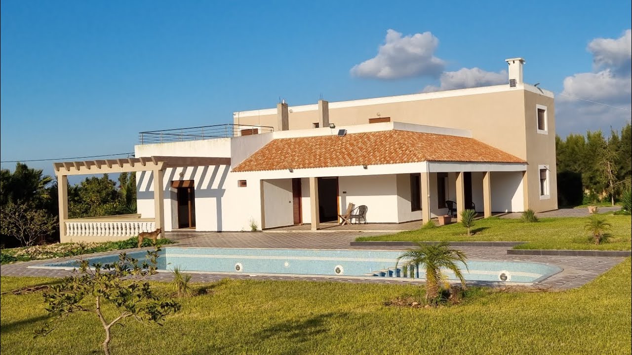 فيرمة وفيلا 4000متر من قلب المدينة الجديدة الحوزية الجديدة تفضل امولاي مرحبا بكم في قناتكم العقارات