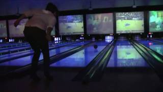 Lili Bowling a Strike