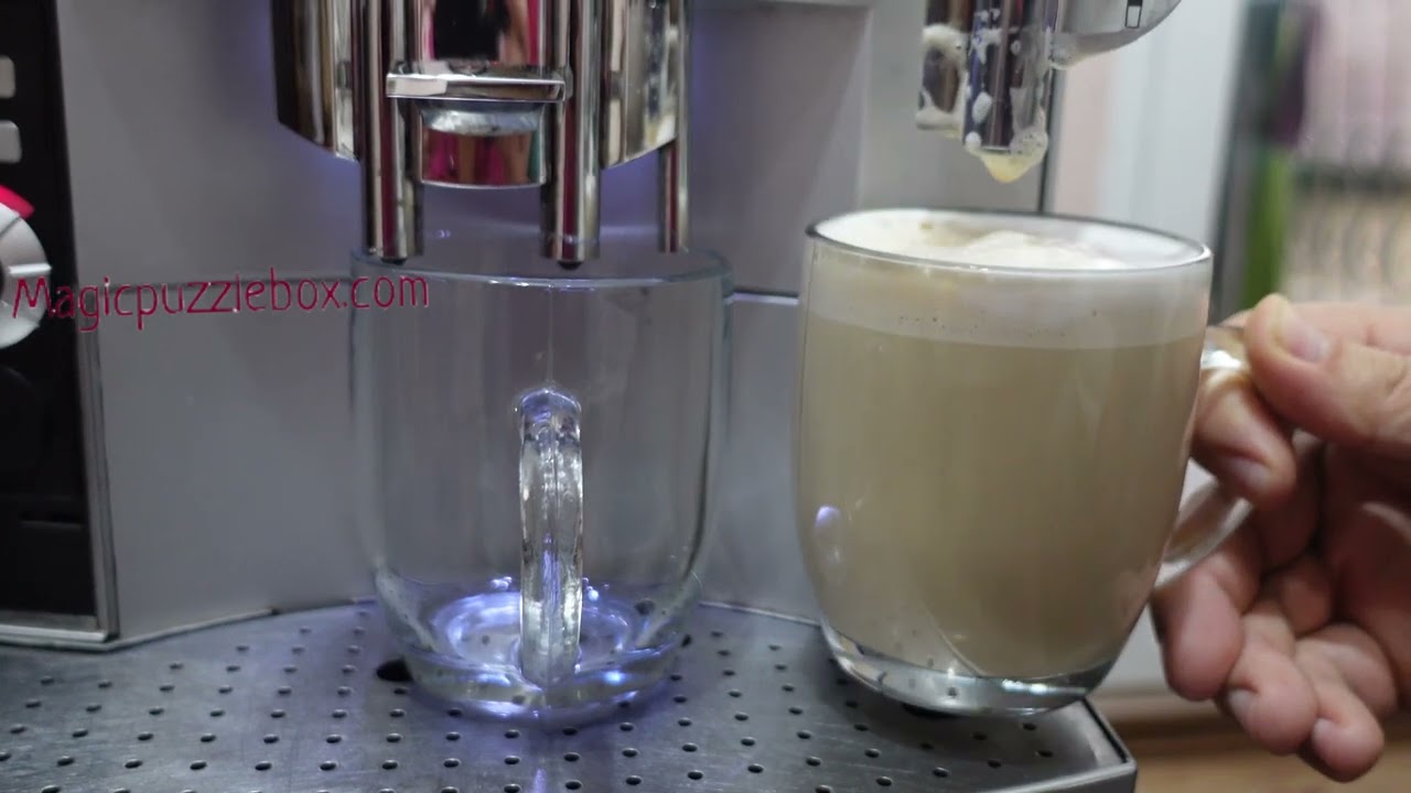 Jura S9 Impressa one touch Swiss Made making Cappuccino with steam and coffee in milk