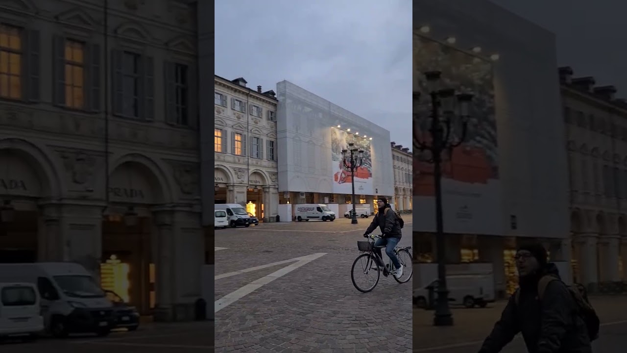 bagpiper in Piazza San Carlo