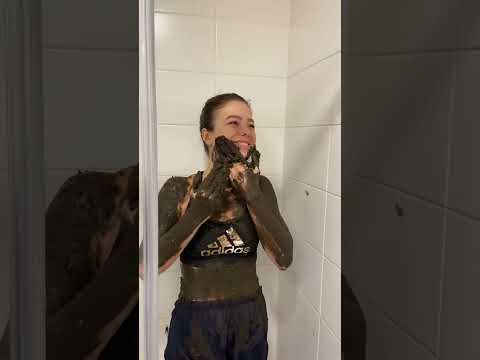 Woman Covered In Mud