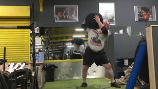 230 pound sandbag to shoulder. Strongman training