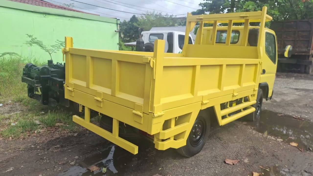 Maksimalkan profit bisnis Anda dengan Mitsubishi Canter FE 71 Truk engkel 4 ban yang tangguh 