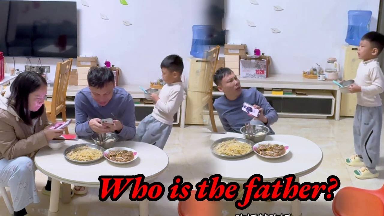 Dad was looking at his phone while eating, so his child kicked him over