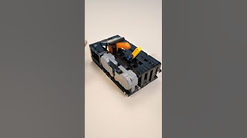 Building a LEGO useless machine via instruction from  www.youtube.com/@poemes. #lego