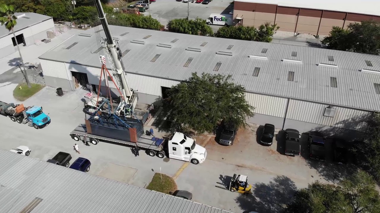 Loading A Massive Pet Crematory For Shipment