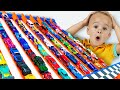 Chris plays with hot wheels cars and builds hot wheels city