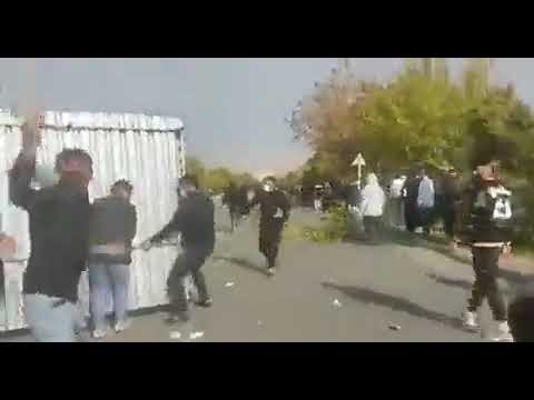 Seqiz, A video which shows protesters trying to use Iron sheets as shield against security forces