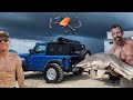Big Pop Pop working to win his challenge while Jonesy drone fishes at the beach.