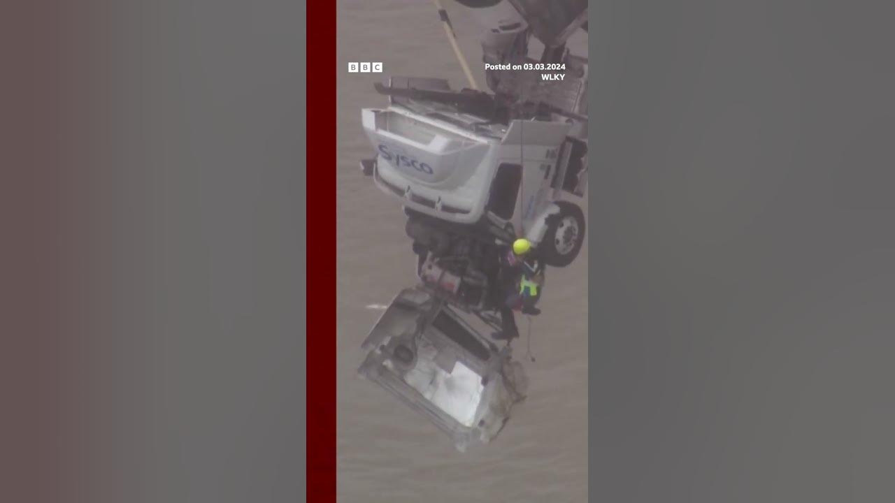 Woman rescued from truck dangling off bridge in Kentucky. #Shorts #Rescue #BBCNews