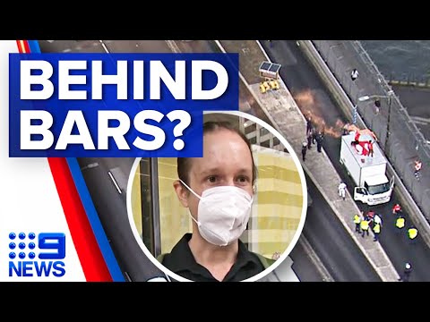 Protester who glued himself to road could face two years in jail | 9 News Australia