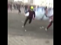 شاهد الشاب العراقي ماذا فعل بقنبلة مسيل الدموع