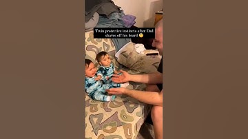 Twin baby protects sibling from 