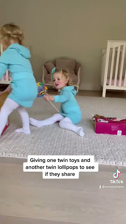 Twins share toys and lollipops. Cutest tiktok video