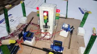 Smart Traffic Light Control System with Automatic Speed Breaker / Barrier