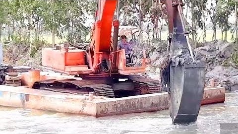 XE CUỐC MÚC ĐẤT TRÊN SÔNG KUBE MỎ VỊT cần cẩu xáng cạp xáng dây xe xúc