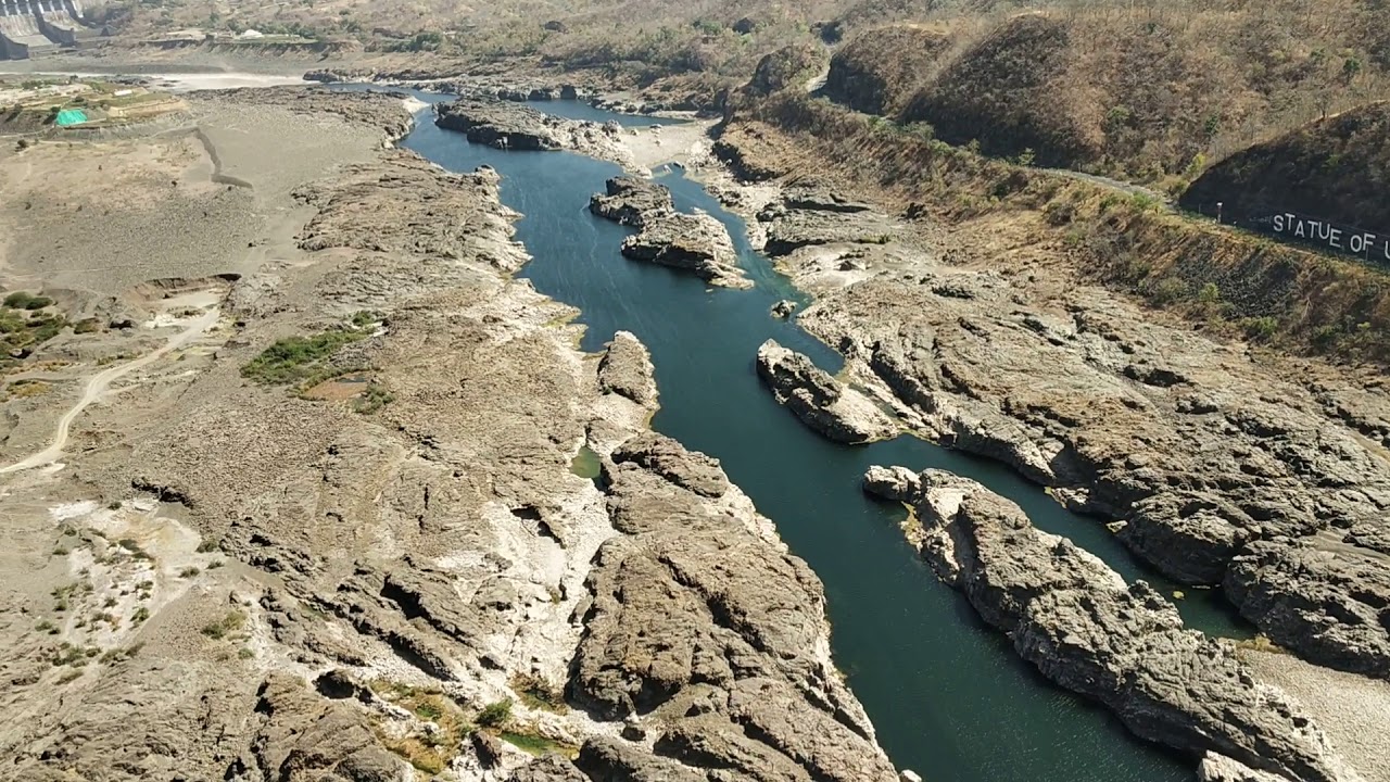 view of sardar sarovar dam from top of the statue of unity