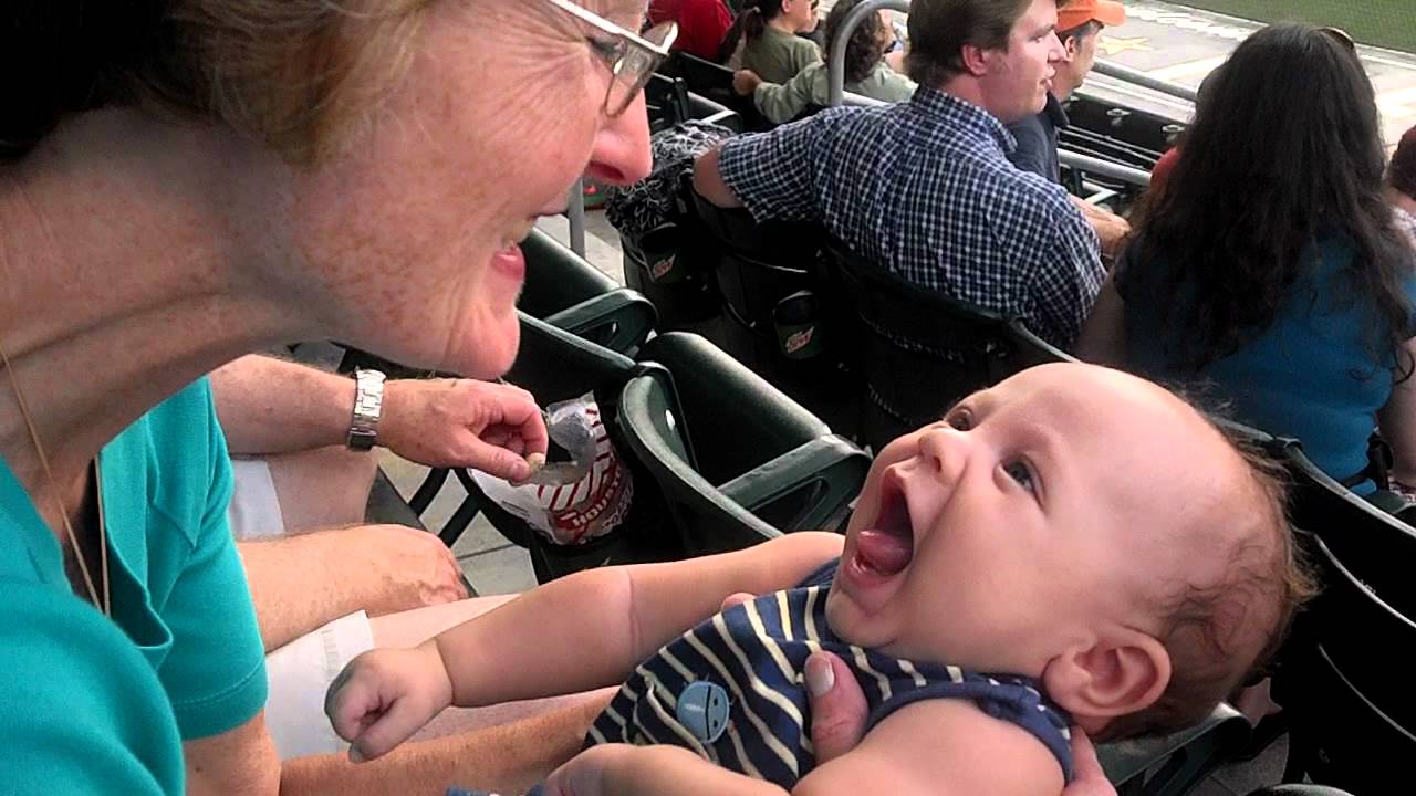 Levi laughing with Grandma at the Greenville Drive YouTube