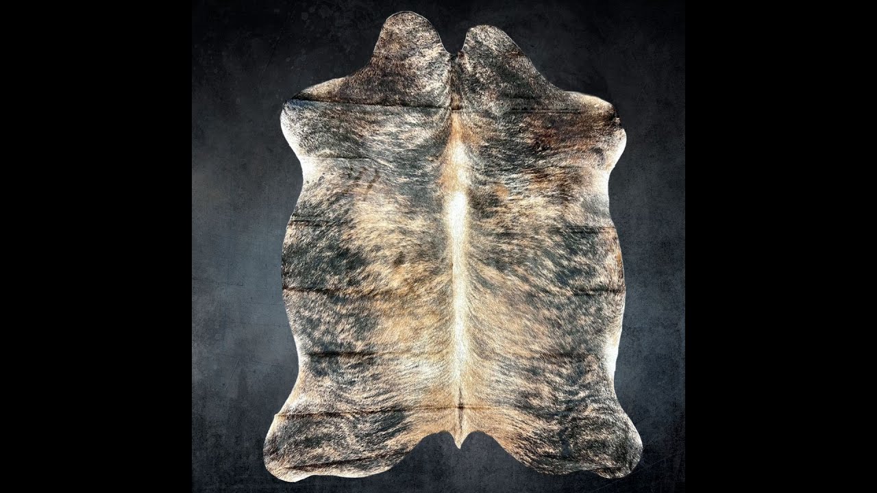 Enhance Your Home with a Stunning Brown Brindle Cowhide Rug | Decor Inspiration