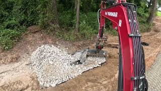 Installing Rock Around The Culvert Pipes