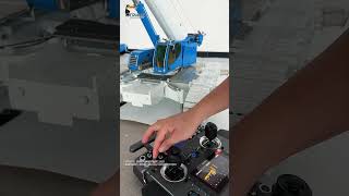 Check out this customer custom blue-white painted 1/14 RC hydraulic telescopic crawler crane D1220