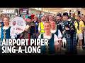 Tartan Army Breakout Flower Of Scotland With Pipers INSIDE Edinburgh Airport as They Jet Off to USA