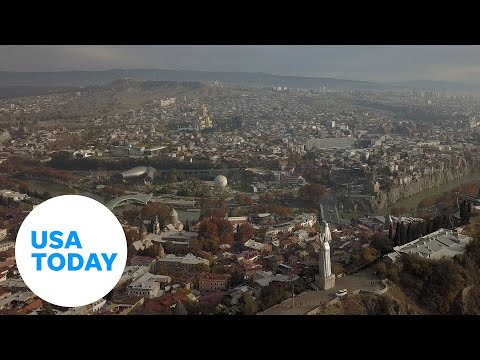 Russians fleeing Putin's war add new strain to old tensions in nearby Georgia | USA TODAY