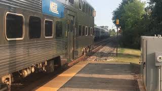 Metra train meets Amtrak train at Northbrook