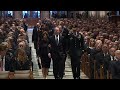 Watch george w bush hands candy to michelle obama ahead of his fathers funeral