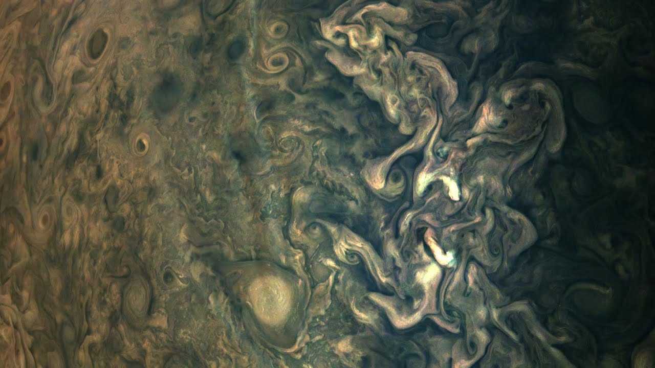 Strange Haze Streaks Seen Floating Above Jupiter's Cloud Tops - YouTube