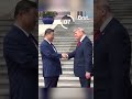 Trump and Xi shake hands for 14 seconds in China
