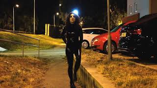 latex catsuit walking in night